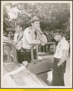 Two Arkansas State police officers and a Little Rock police officer