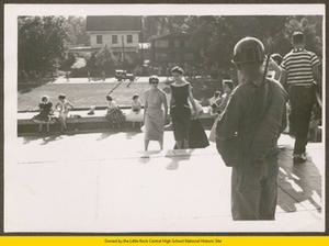 101st Airborne soldier looks on as two female students enter Central High School