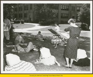 Students sketching National Guard troops