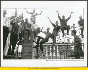 White students protesting integration pose on Governor's Mansion fence