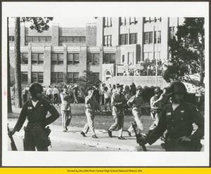 Major General Edwin A. Walker inspects 101st Airborne soldiers guarding Central High School