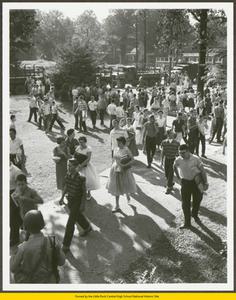 White students and soldiers in front of Central High School