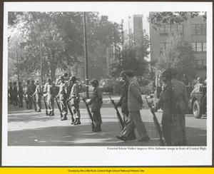 General Edwin Walker inspects 101st Airborne soldiers in front of Central High School