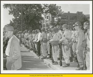 Military troops standing in front of Central High School