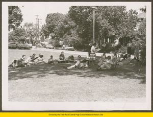 Students sketching National Guard troops