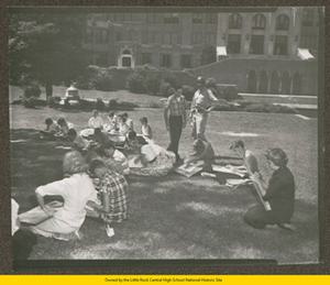 Students sketching National Guard troops