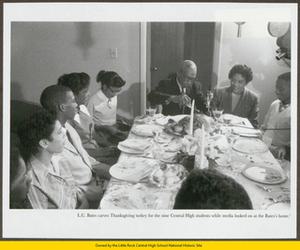 Carlotta Walls, Terrence Roberts, Melba Pattillo, Thelma Mothershed, and Jefferson Thomas have Thanksgiving with L.C. Bates and Daisy Bates