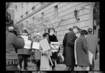 Protesters with signs reading "Unlock the Doors and Open the Schools" and "Let Education Go On" outside the Pittsburgh Board of Education building