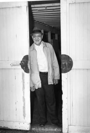 Alonzo Wright at stable door of Chesterland farm, 1961