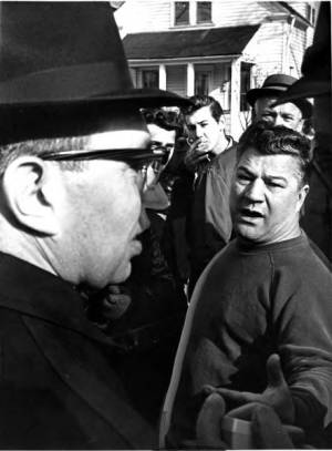 Man confronting Reverend Trivison