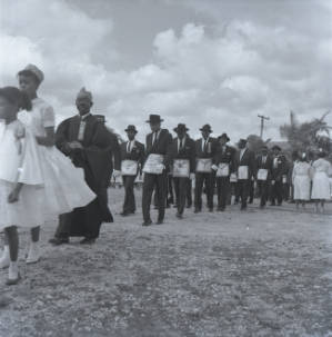 Group of people attending Baptist church groundbreaking ceremony