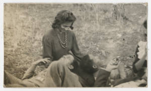 Group of youngsters sitting on the grass