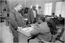 Nick Lambros, John Calhoun, Marvin Arrington, and E. Gregory Griggs
