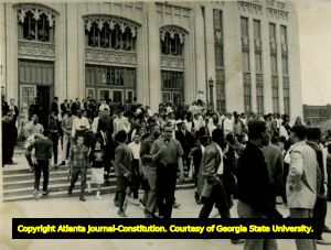 Civil rights protestors congregating outside of City Hall. Atlanta, Georgia, March 1963.