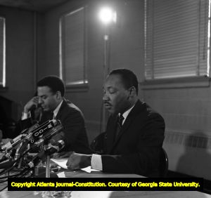 Martin Luther King Jr. and SCLC director Andrew Young during a press conference, 1967
