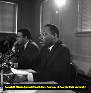Martin Luther King Jr. and SCLC director Andrew Young during a press conference, 1967