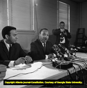 Martin Luther King Jr. and SCLC director Andrew Young during a press conference, 1967