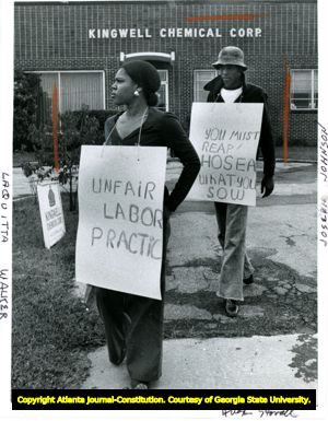 Two demonstraters picketing the Kindwell Chemical Corp., owned by Hosea Williams, Atlanta, Georgia, October 1975.
