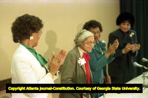 Rosa Parks on a panel with Linda Brown Smith, and DeLores Tucker speaking at the Women and the Constitution conference, 1988