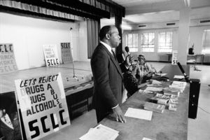 Council member John Lewis speaking at a SCLC rally against drug and alcohol use, 1986