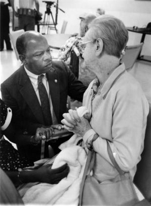 Representative John Lewis meets with residents at the Great Oaks Nursing Home to discuss concerns with senior citizens, 1989