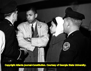 Police with two Civil Rights workers, Atlanta, Georgia, March 17, 1960.