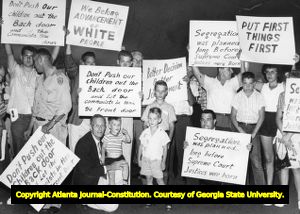 Pro-segregation demonstrators picketing at Governor Ernest Vandiver's mansion, Atlanta, Georgia, July 14, 1959.