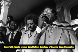 Tyrone Brooks and other civil rights leaders speaking at a civil rights rally, Social Circle, Georgia, February 20, 1982.