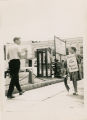 Protester with sign, "Protest Jim Crow Police Power"