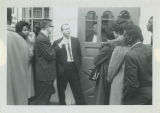 Students barred from Cross Keys restaurant, guards stand at door.
