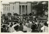 Protesters gather outside building