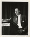 Man speaking at podium at SCEF reception