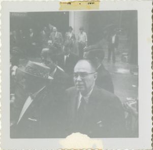 Group of men gathered in street