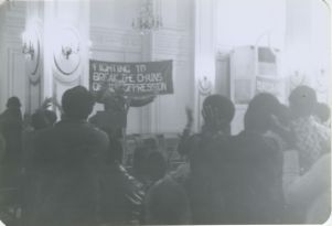 Man speaking at microphone at SCEF event