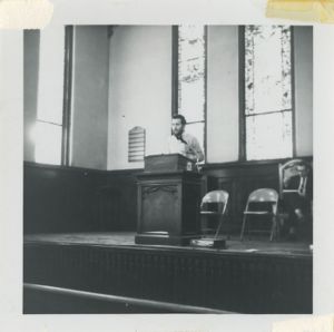 Man speaking at podium
