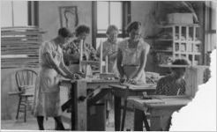 Female WPA carpenters building children's toys for Christmas