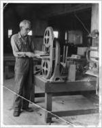 Frank J. Morris performing carpentry work