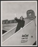 [Rosa Parks waves from a United Air Lines jetway at a stop in Seattle, Washington, 1956, while travelling throughout the country raising attention to the Montgomery bus boycott] [graphic] /
