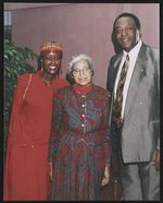 [Rosa Parks, Jim Parker (board member, Rosa and Raymond Parks Institute) and unidentified woman at an event] [graphic].