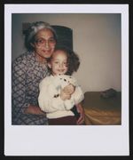 [Rosa Parks posing with children] [graphic].