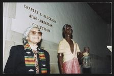 [Rosa Parks, half-length portrait, standing near statue and sign reading "Charles L. Blockson Afro-American Collection," Temple University, Philadelphia, Pa.] [graphic] /