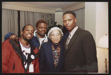 [Rosa Parks with singers Ricky Bell, Michael Bivins and Ronnie DeVoe during event at the Watergate Hotel, Washington, D.C.] [graphic].