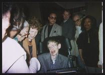 [Physicist Stephen Hawking, Rosa Parks and others at an event] [graphic].