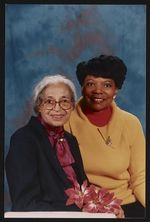 [Rosa Parks and Elaine Steele, half-length portrait with poinsettia] [graphic] /