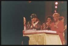 [Rosa Parks, C. Delores Tucker, Dionne Warwick and others standing near sheet cake during birthday gala for Parks at the Kennedy Center, Washington, D.C., 1990] [graphic].