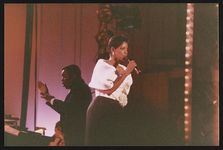 [Entertainer Melba Moore performing at Rosa Parks' birthday gala, Kennedy Center, Washington, D.C., 1990] [graphic].