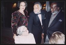 [Rosa Parks talking to guests during a Brotherhood Crusade tribute to Parks and Muhammad Ali, Los Angeles, California, 1994] [graphic].
