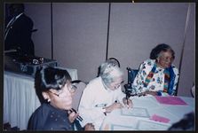 [Rosa Parks signing certificates for students, Detroit, Michigan] [graphic].