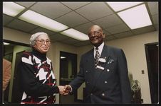 [Rosa Parks shaking hands with an unidentified man, at an event, Detroit, Michigan] [graphic] /