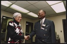 [Rosa Parks shaking hands with an unidentified man at an event, Detroit, Michigan] [graphic] /